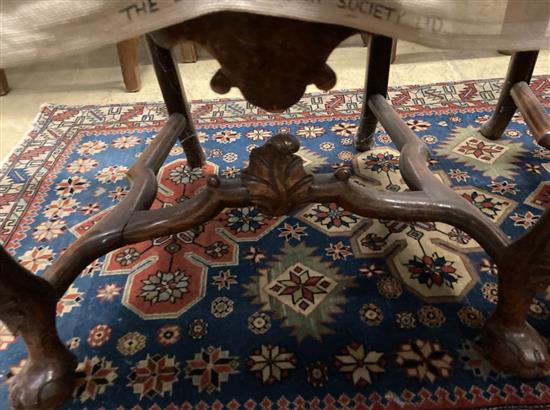 A pair of early 18th century Dutch carved walnut side chairs